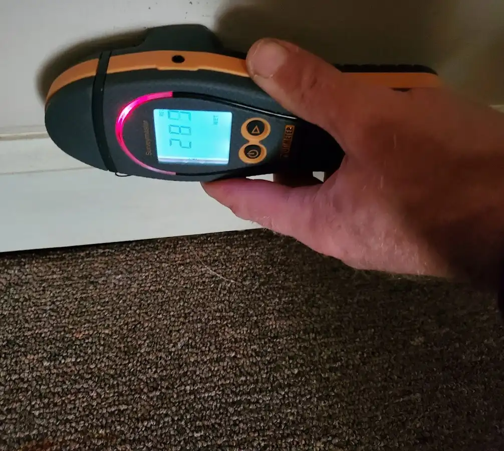 Moisture detection at baseboard during Burst Pipe Cleanup in Fort Atkinson